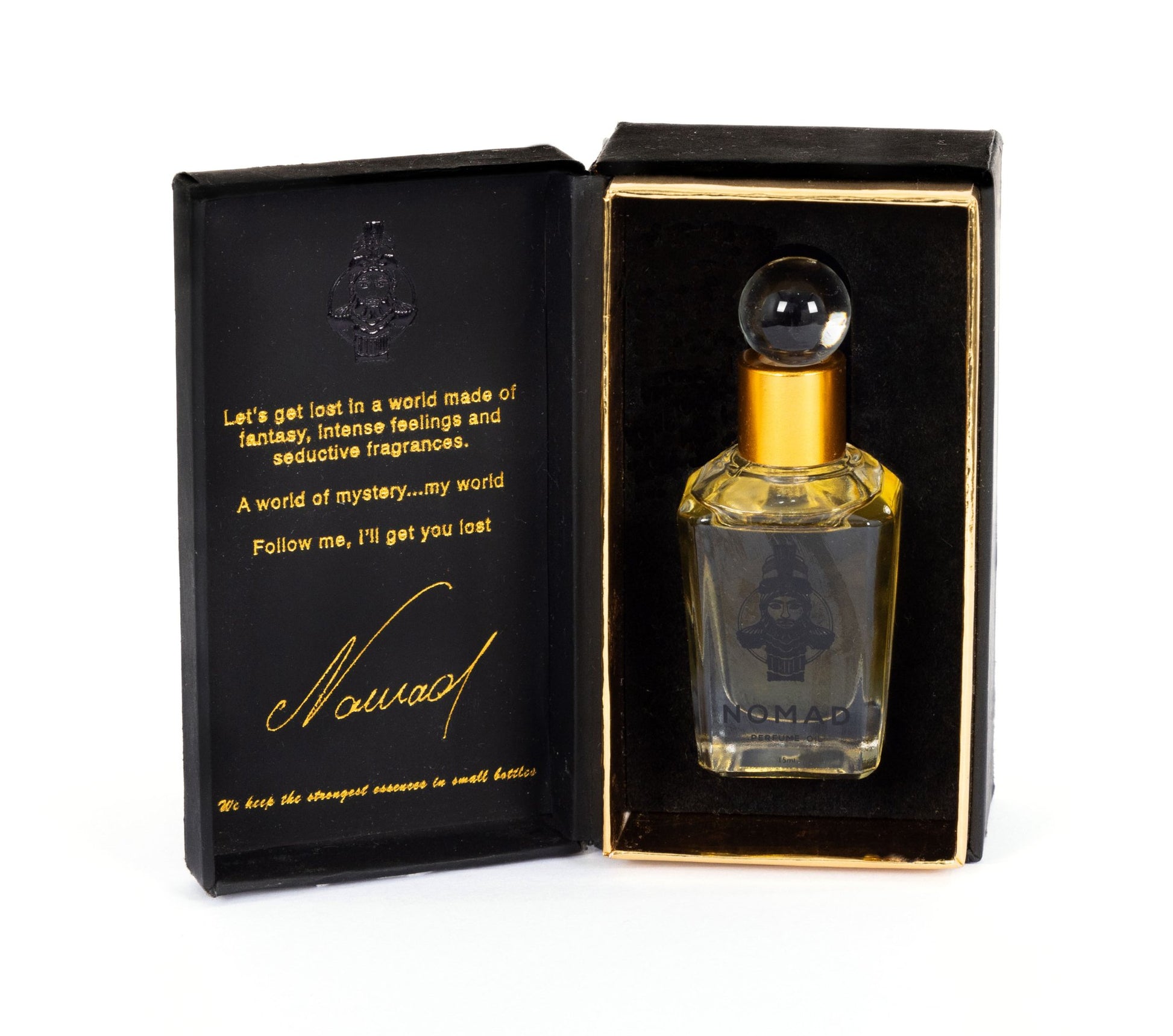 Nomad perfume oil bottle nestled inside a stylish box, capturing the essence of an alluring and captivating fragrance